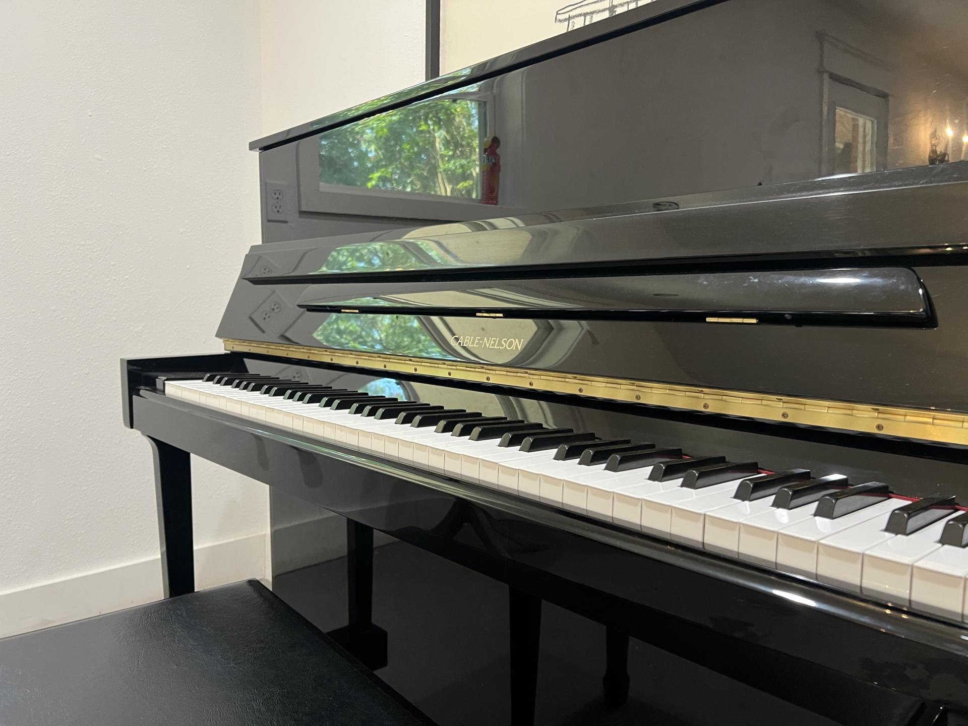Cable & Nelson (Yamaha) C116 Upright Piano in Black Polyester – Gallery image – Roberts Pianos Houston