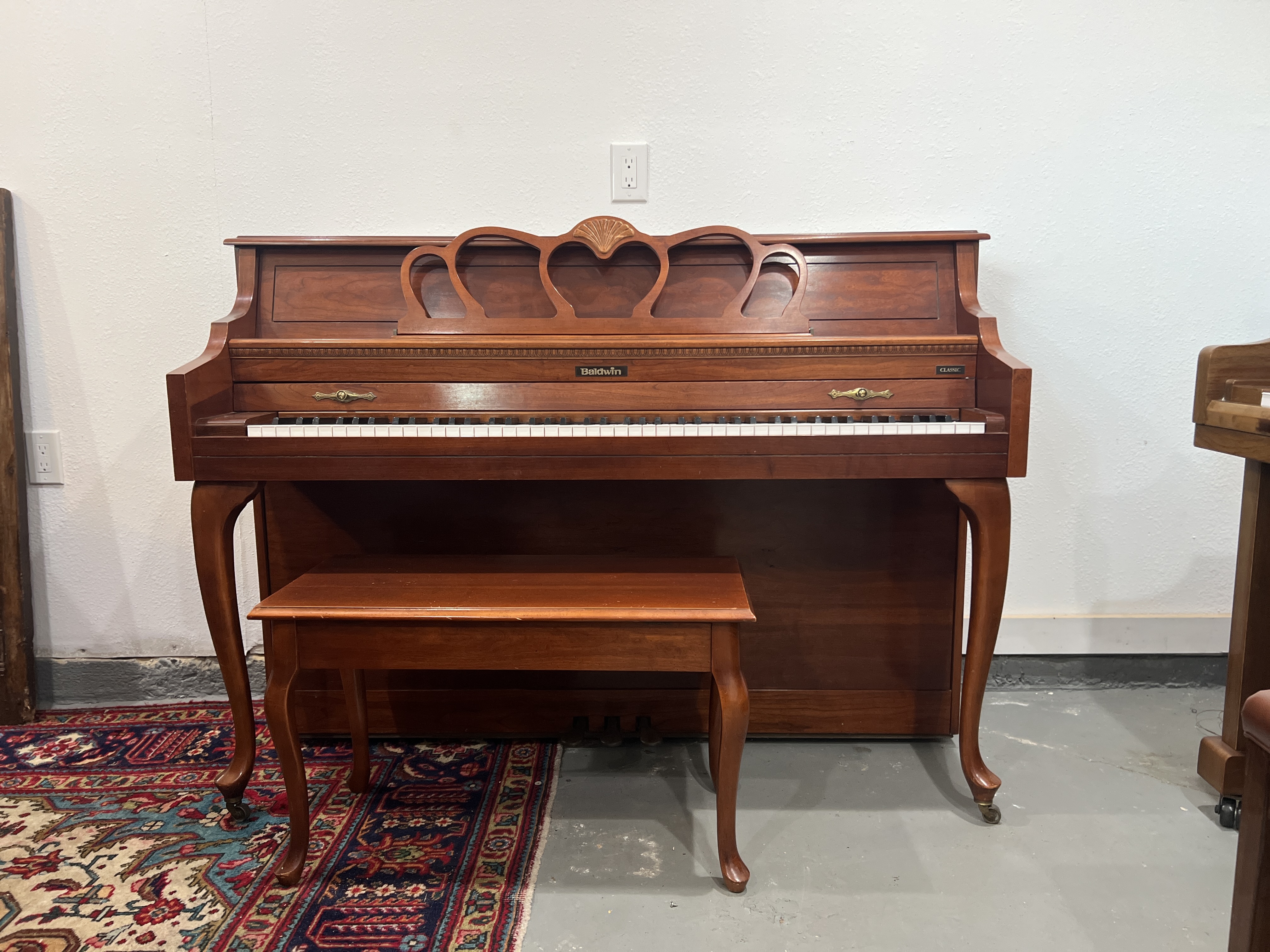 Baldwin Console Piano Piano in Mahogany – Gallery image – Roberts Pianos Houston